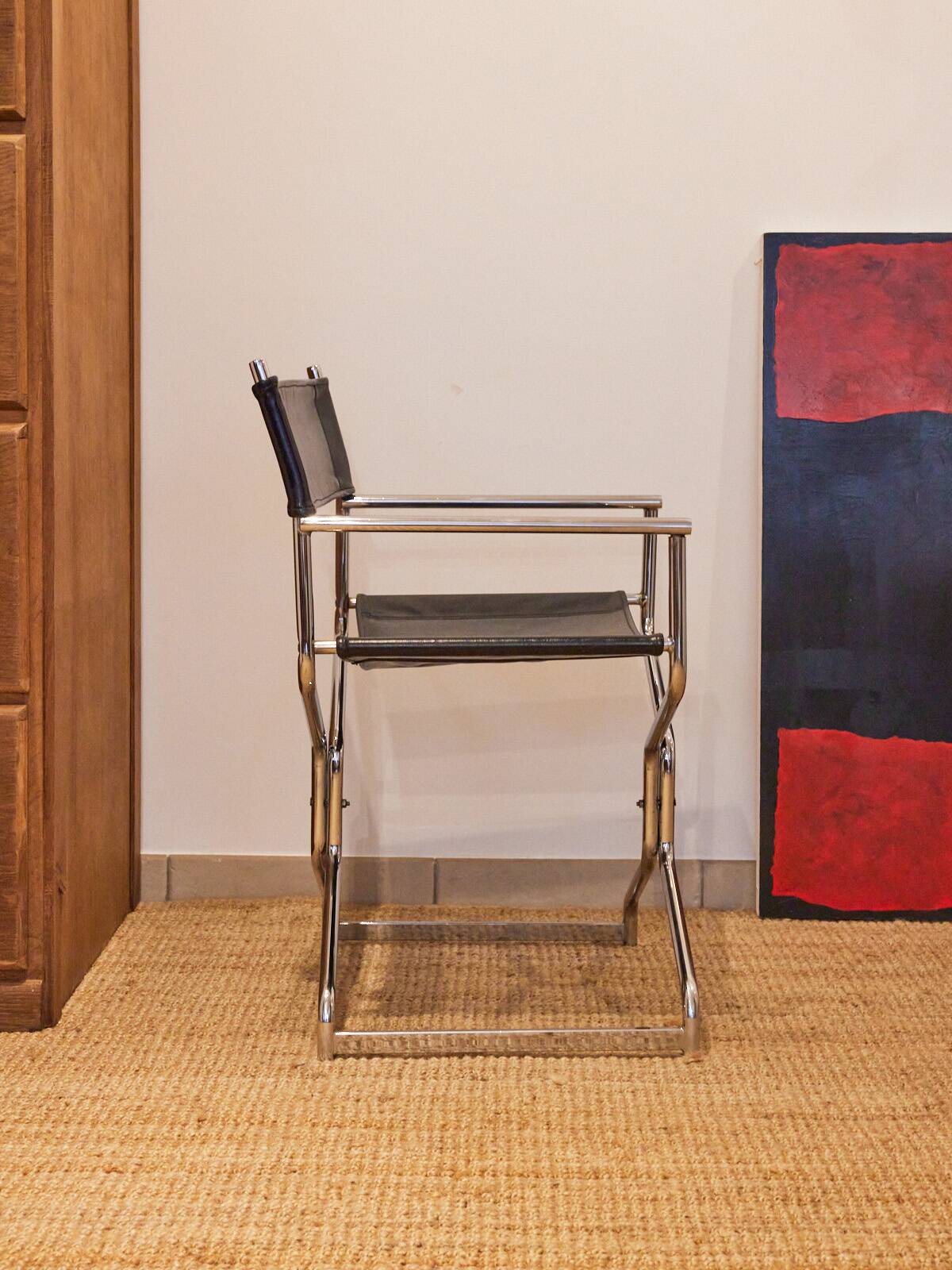 Folding cantilever chair in tubular metal