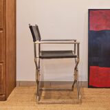 Folding cantilever chair in tubular metal