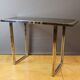 Chrome and gilded console by Romeo Riga around 1970