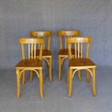 4 Baumann 1950 bistro chairs in “golden oak” color