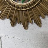 Vintage 1970s convex witch's eye sunburst mirror