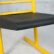Adjustable seat chair. Circa 1980. Italy. Yellow lacquered steel.