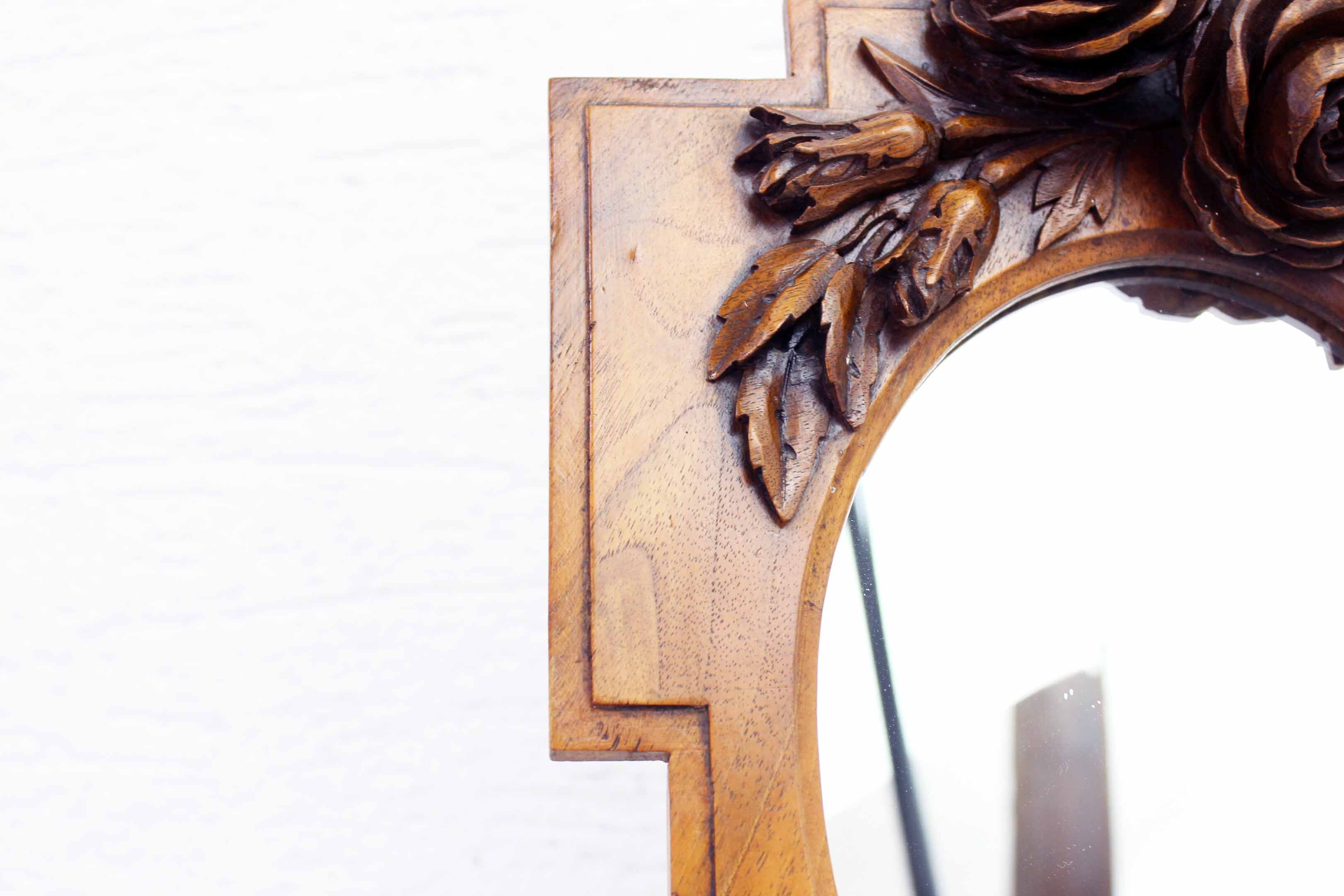 Ancient carved walnut frame mirror