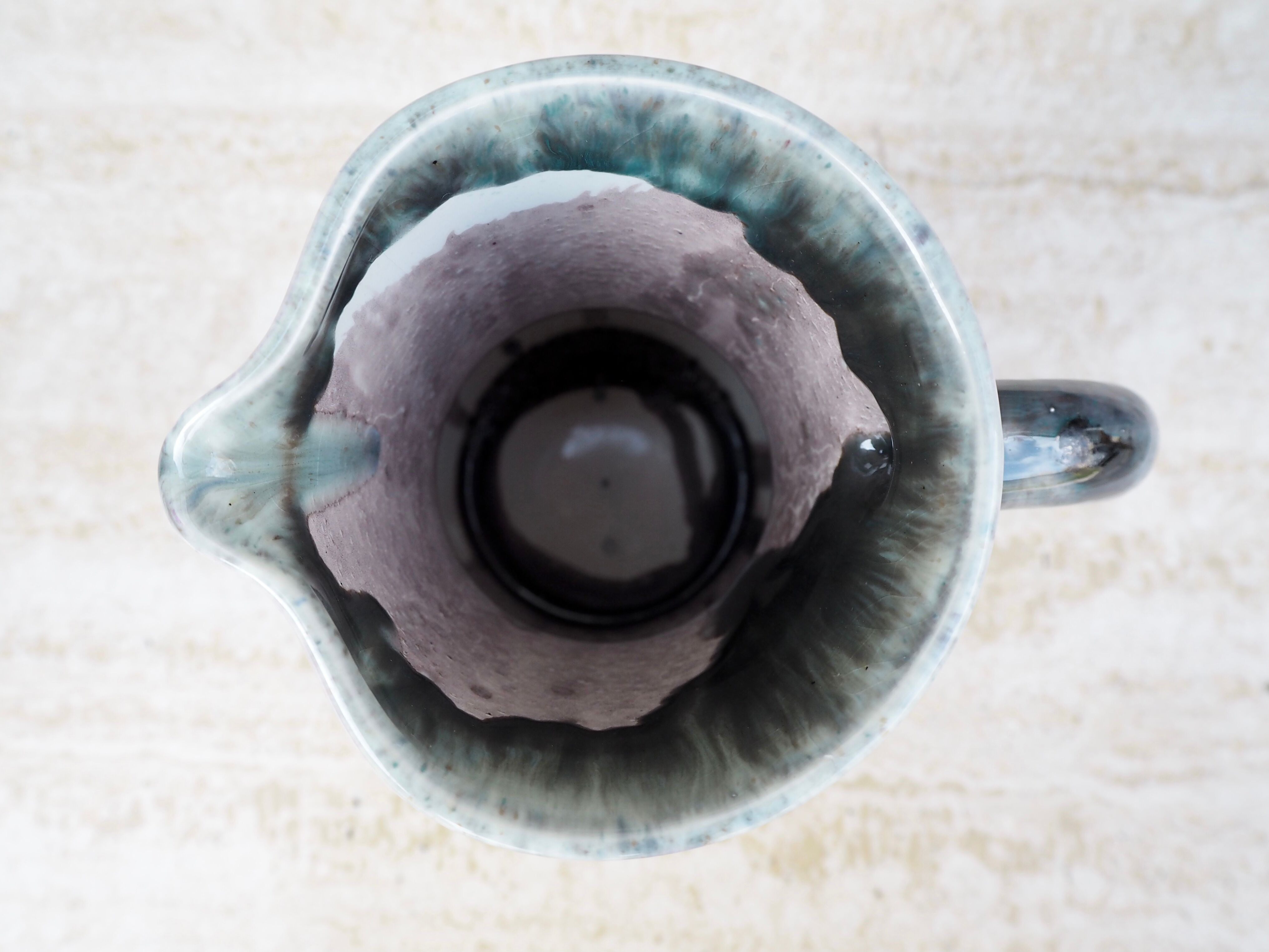 Enamelled ceramic pitcher signed Morvan