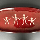 Large red ceramic dish