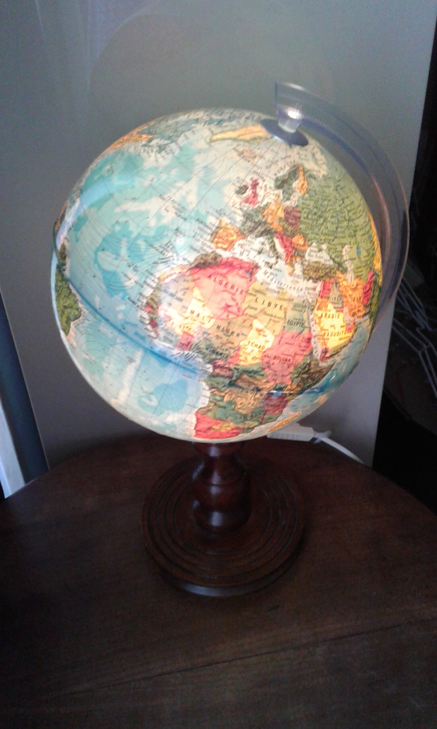 World map globe bright foot and wooden support