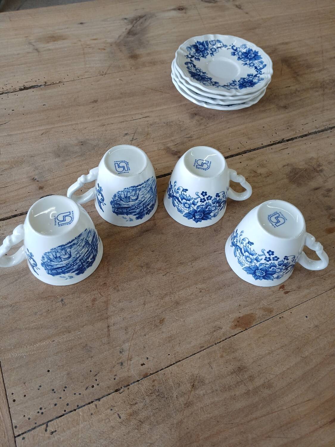 4 antique cups and saucers