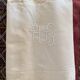 Drap en metis monogramme HG.