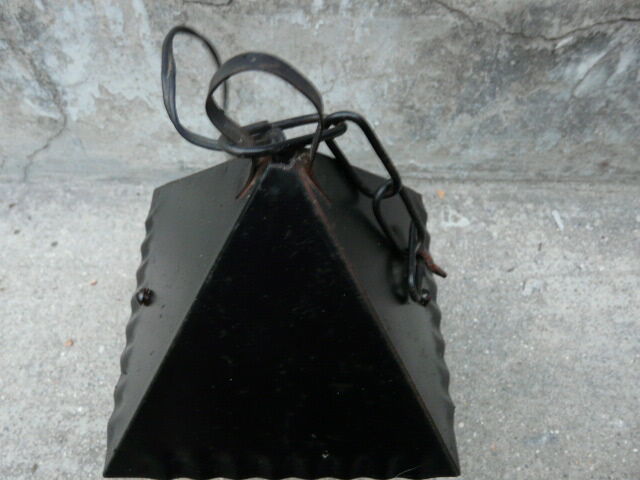 pair of wrought iron lanterns and granite glass