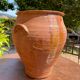 Ancient terracotta pottery jar