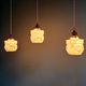 Art Deco trio of suspensions in opaline and marbled ouraline, Scailmont, 1920-30.