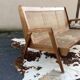 Cane-seated teak bench