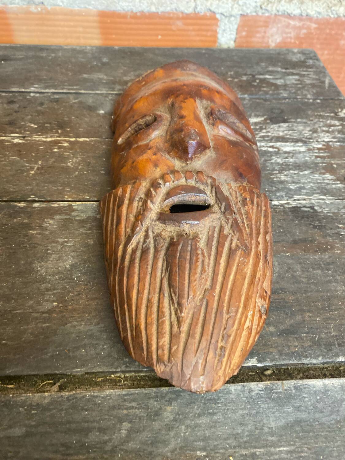Moroccan mask in carved wood vintage decoration