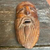 Moroccan mask in carved wood vintage decoration