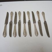 9 anciens couteaux en inox Grossmann