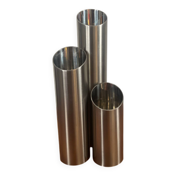 Vintage trio of brushed stainless steel candle holders