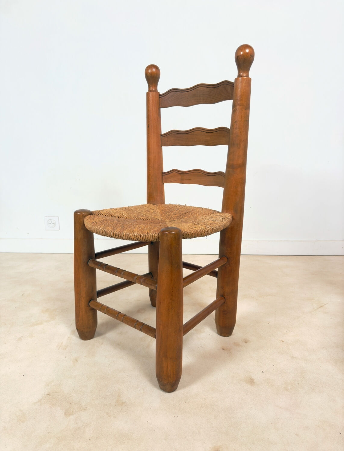 Vintage wooden chair with rush seating