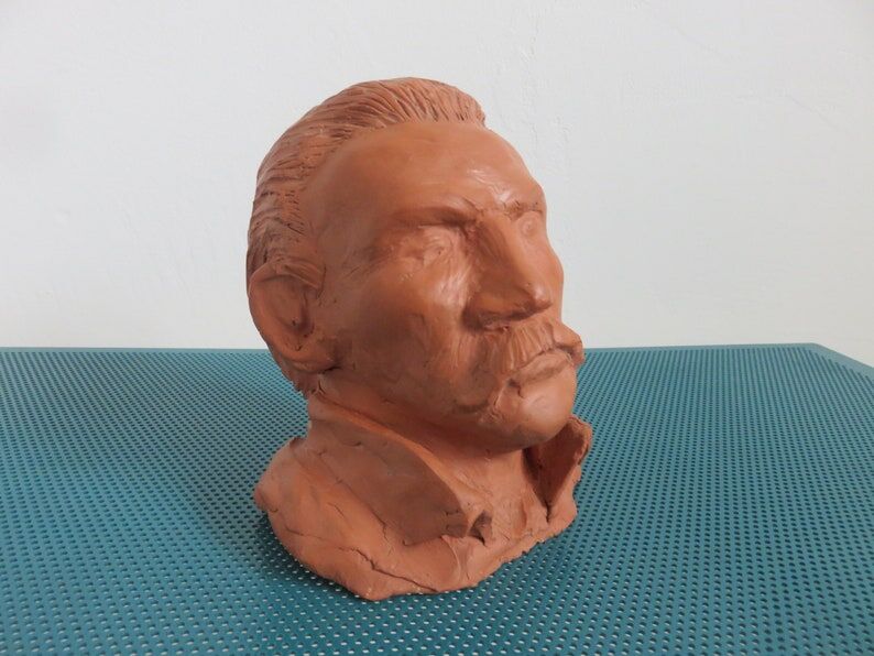 Ancient terracotta bust statue