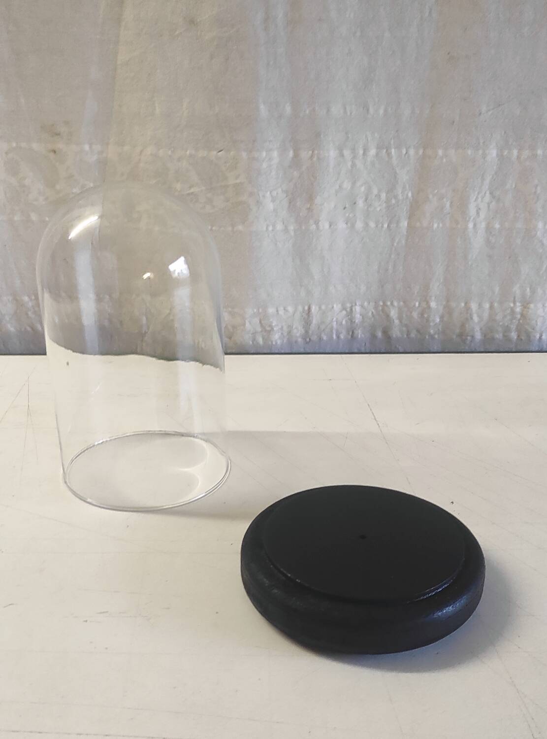Glass globe and black wooden base - mid 20th century