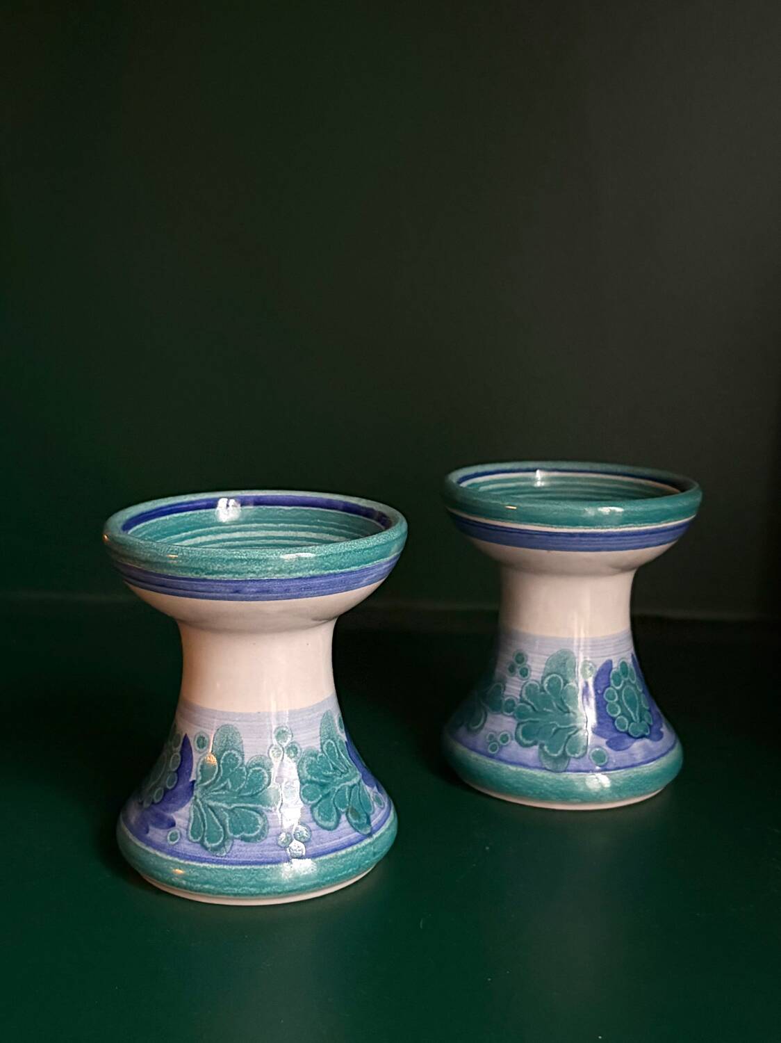 Two ceramic candlesticks
