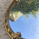 Oval mirror - wood and gilded stucco with decoration of