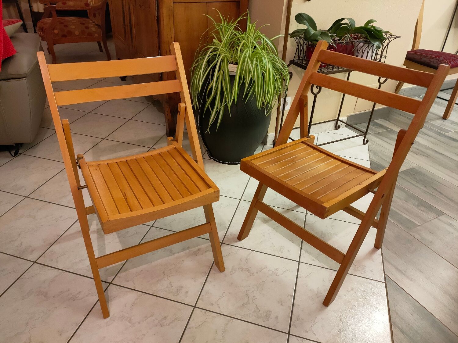 Pair of vintage folding wooden chairs