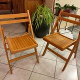 Pair of vintage folding wooden chairs