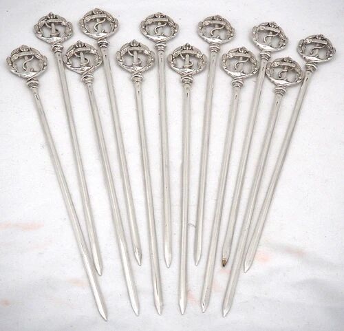 Christofle, 12 skewers, brochettes, metal silver-plated meat picks, anchor.