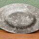 Plat en étain repoussé, art déco