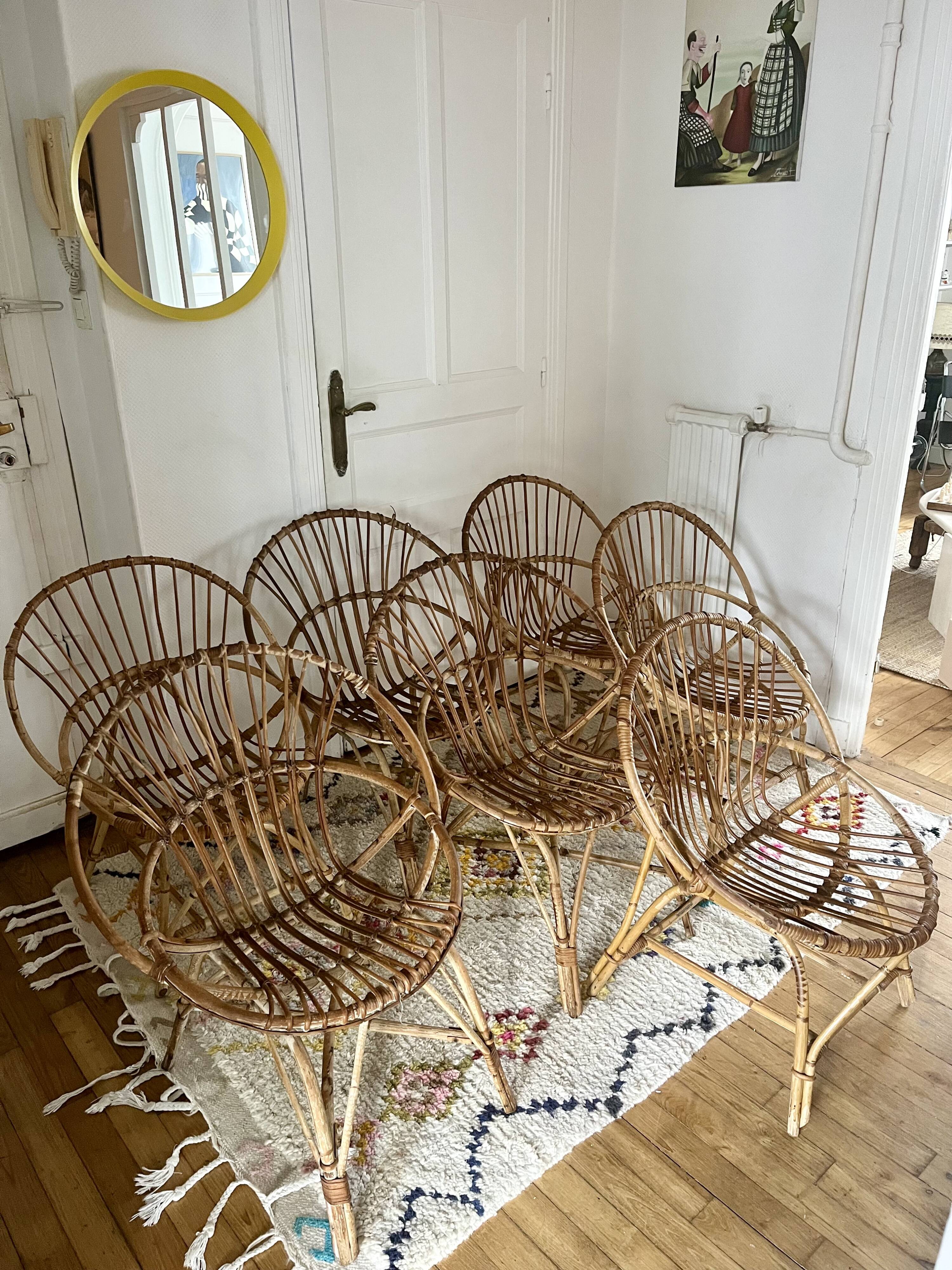 7 vintage rattan armchairs