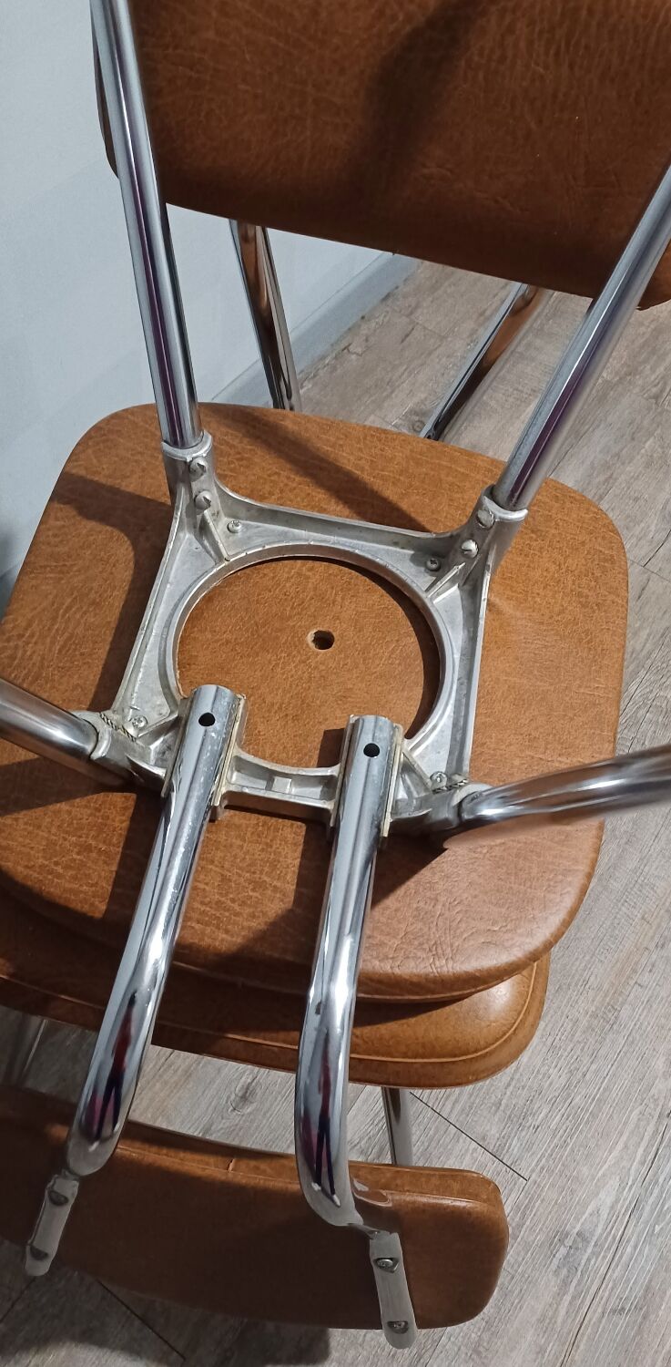 Pair of vintage faux leather and chrome chairs