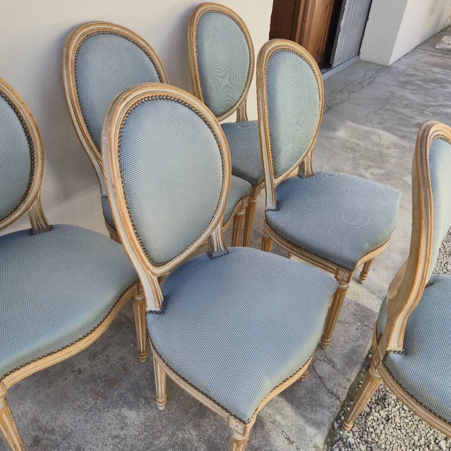 Set of 6 Louis XVI style chairs with antique patinated medallion