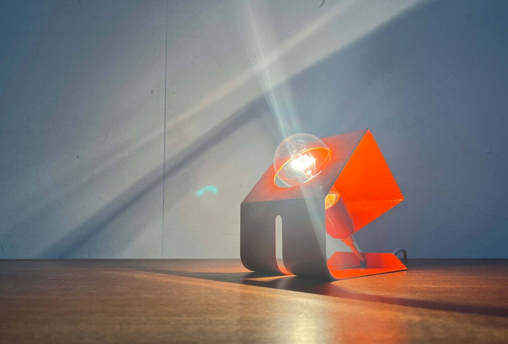 Orange metal table lamp, minimalist, modern mid-century space age, 1960s.