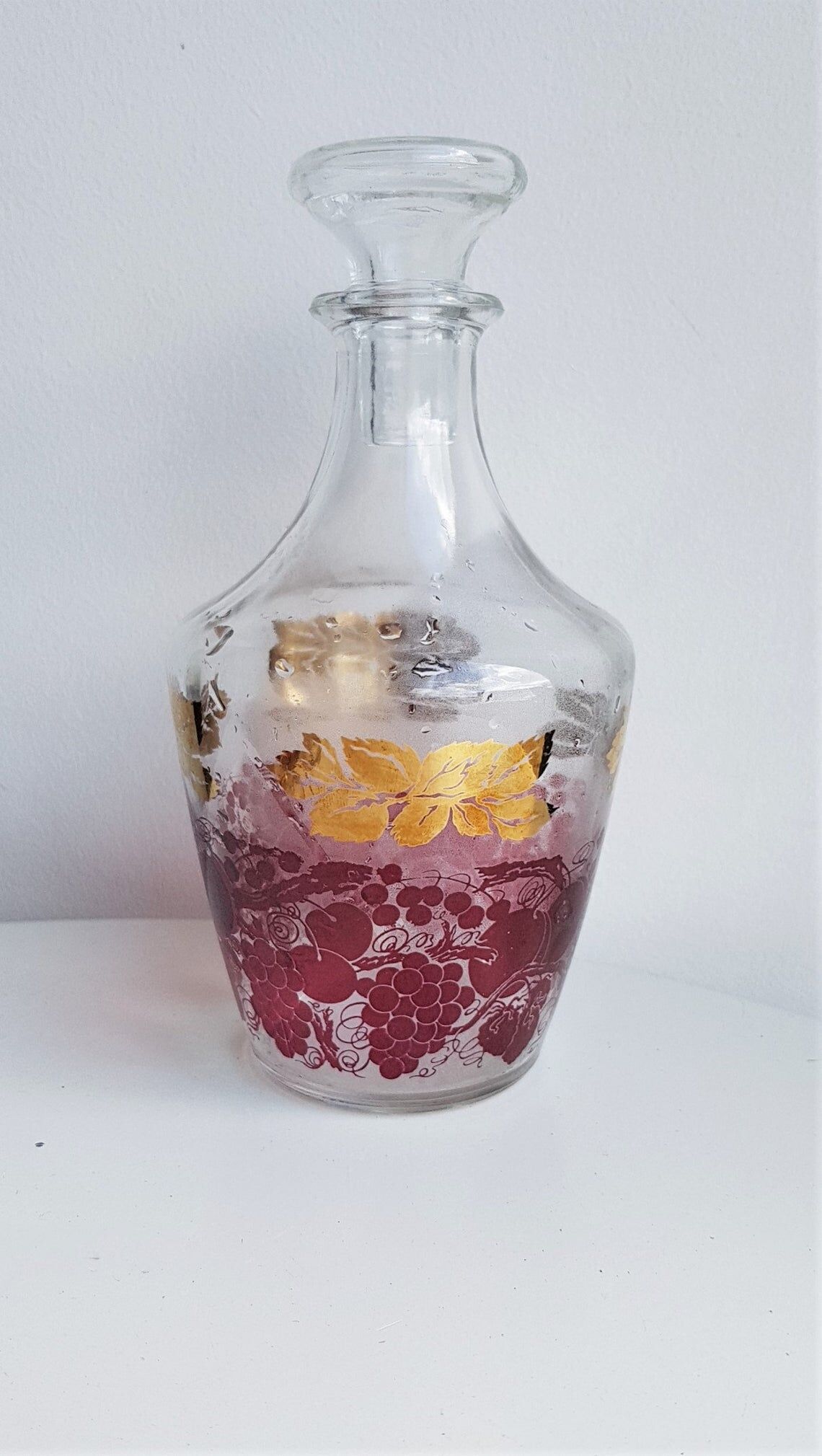 Pink and gilded glass liquor service