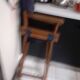 2 old director’s armchairs.