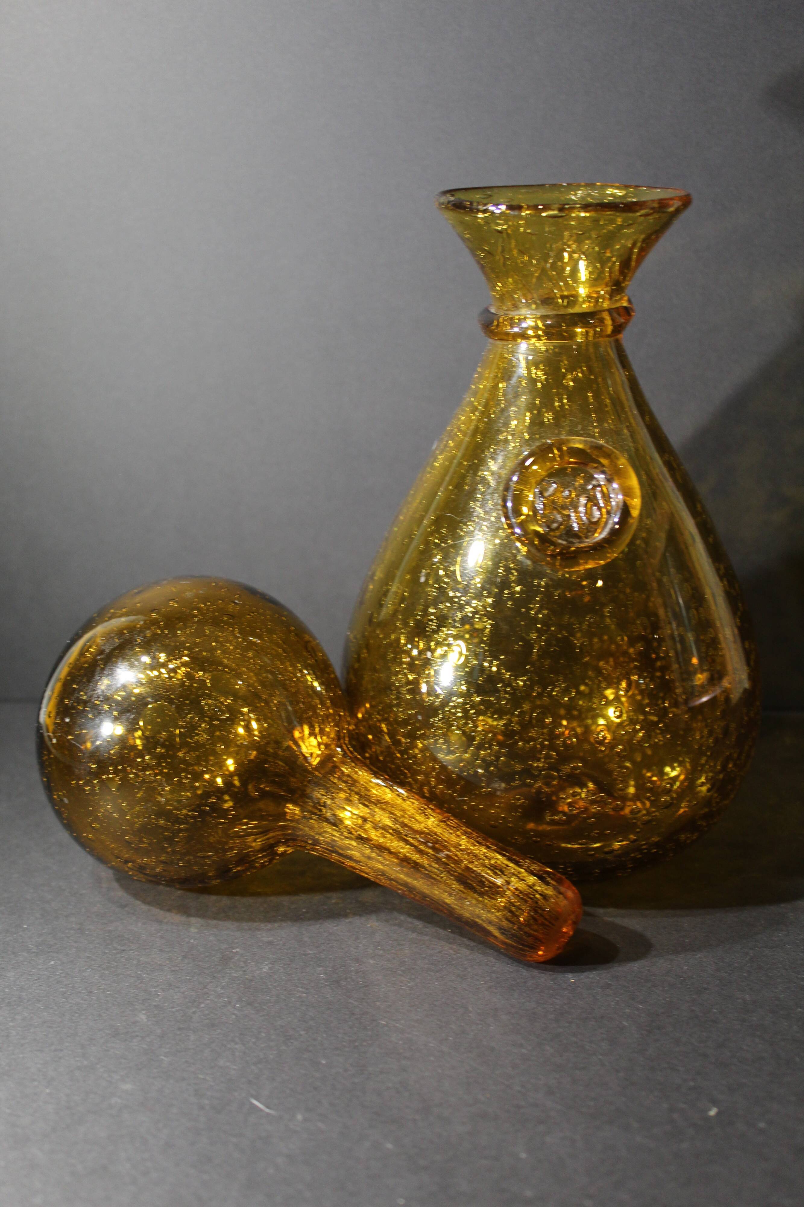BIOT orange bubbled glass hourglass carafe