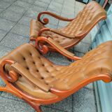 Paire de fauteuils type Chesterfield