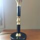 Vintage lamp base in black leather and brass