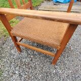 Scandinavian armchair of the 50s in cherry tree sitting in rope