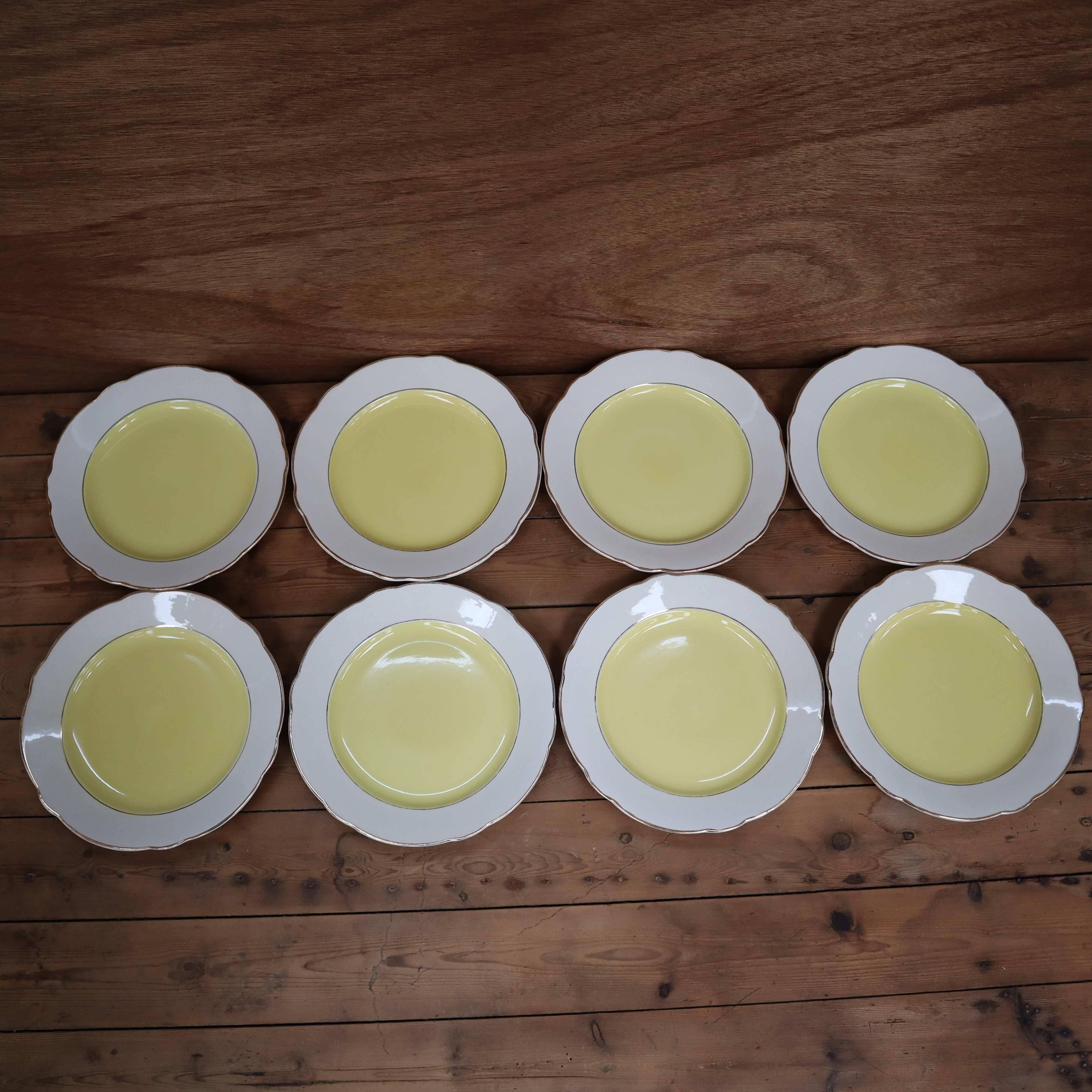 Set of 8 KG Lunéville yellow and white flat plates