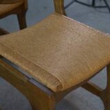 Set of 6 oak dining chairs with rush seat and 'Echelle' backrest in the style of Guillerme et Chambron 1950s