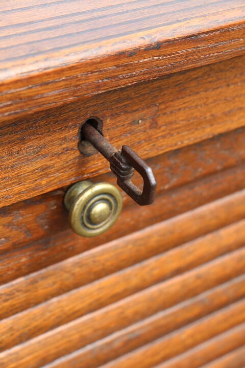 Dark single curtain cabinet