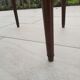 Gray marble mahogany pedestal table and brass gallery
