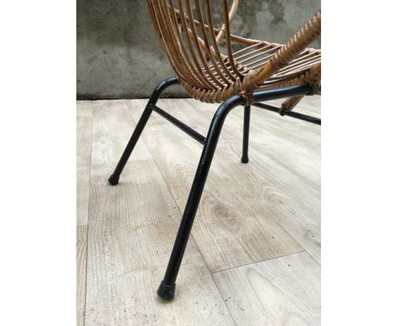 Pair of rattan shell chairs with metallic feet