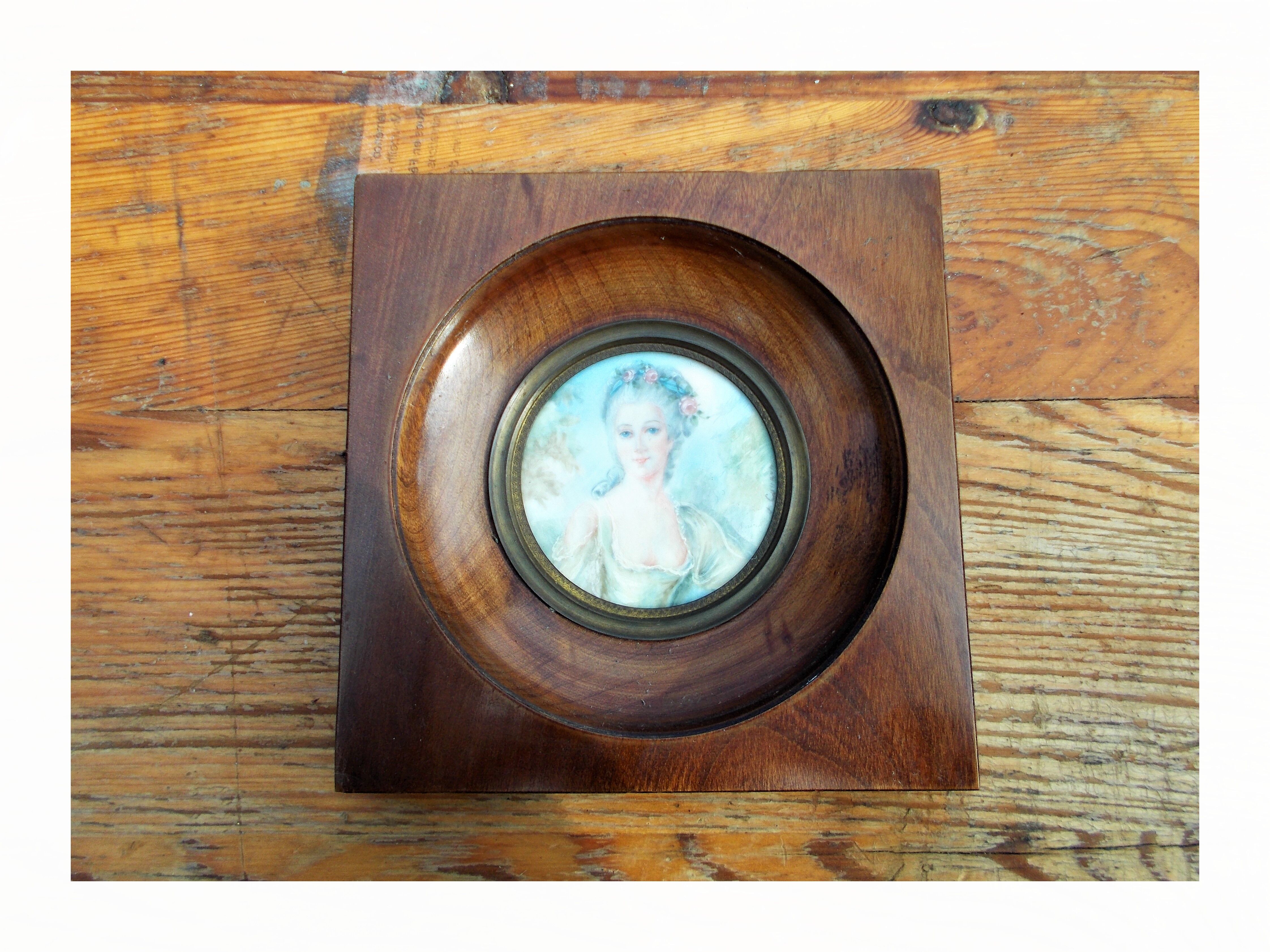 Miniature hand-painted portrait of a woman signed