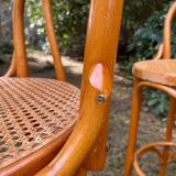 Set of four cane and webbing bar stools