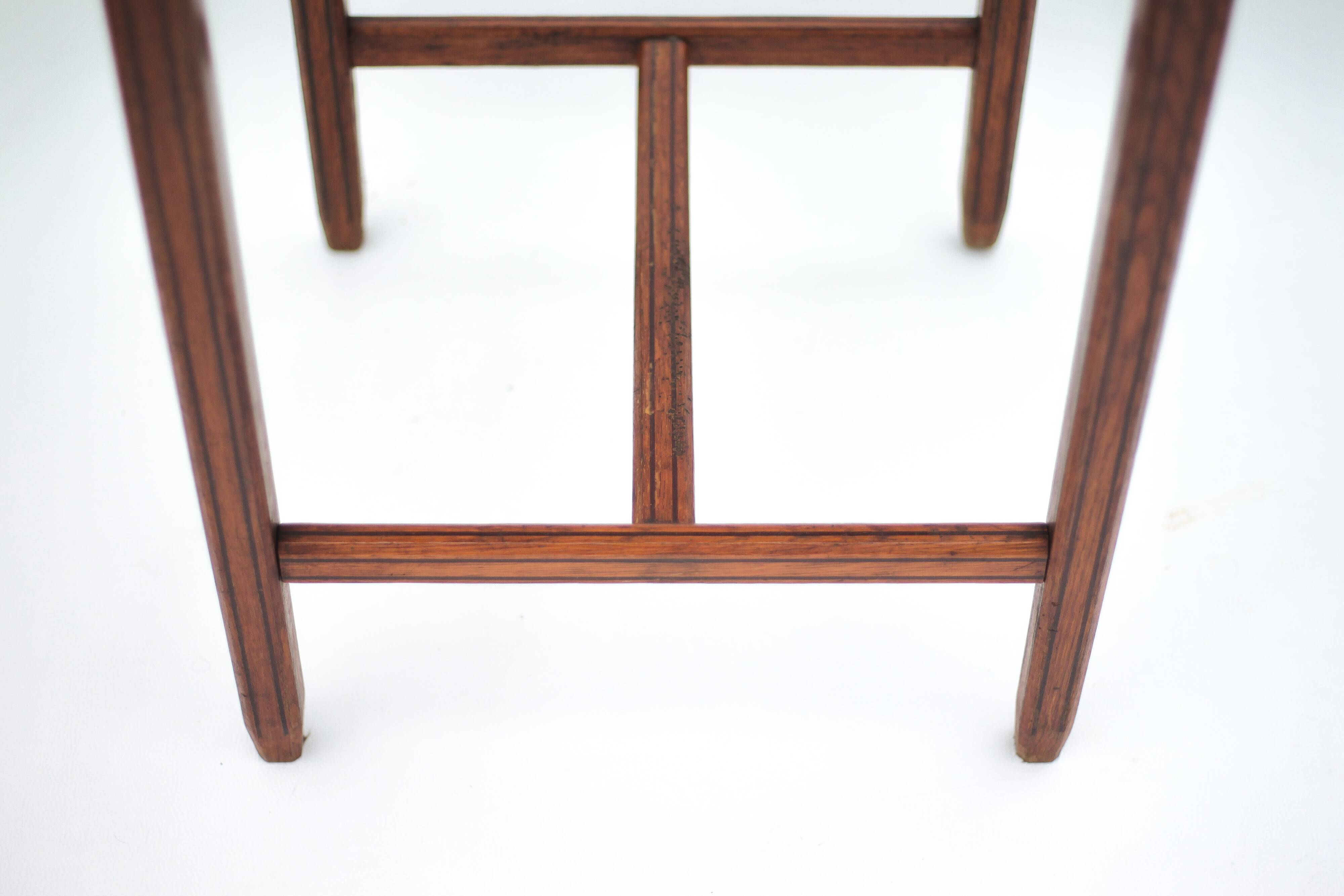Wood table with marquetry, table with an antique parquet top, antique table.