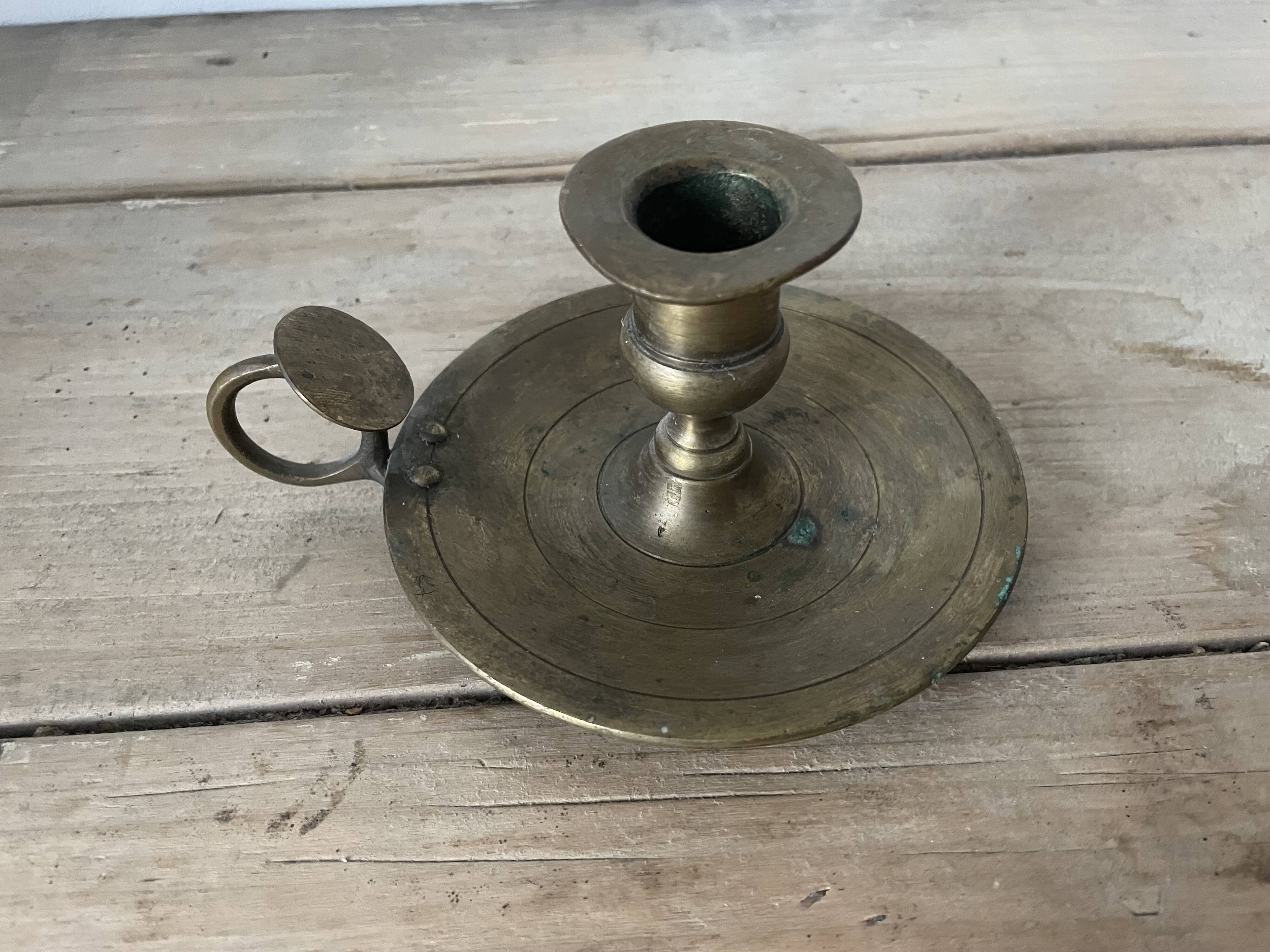 Old brass candle holder