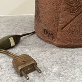 Large chamotte clay lamp in brutalist style, with a plant motif.