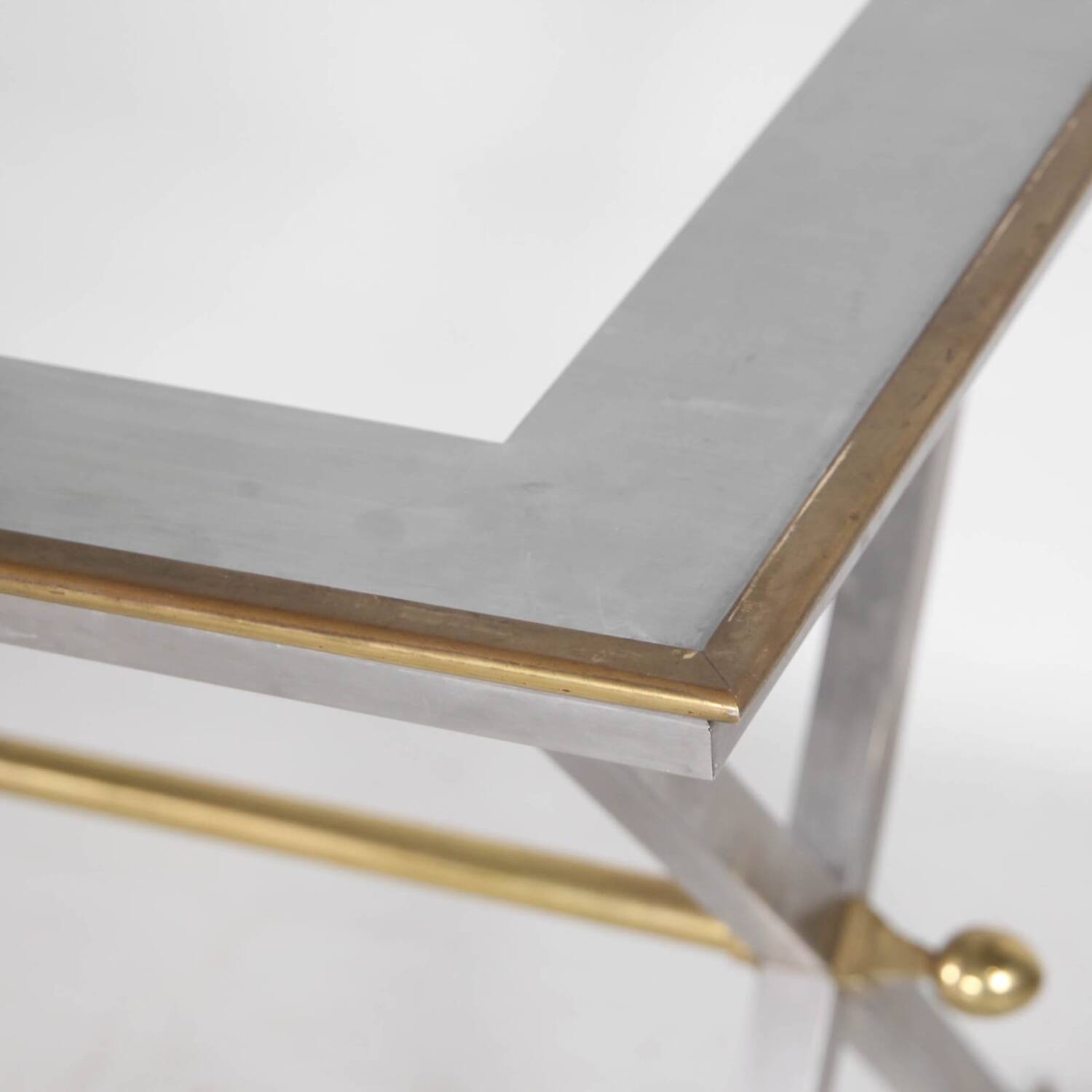 Stainless steel and brass table
